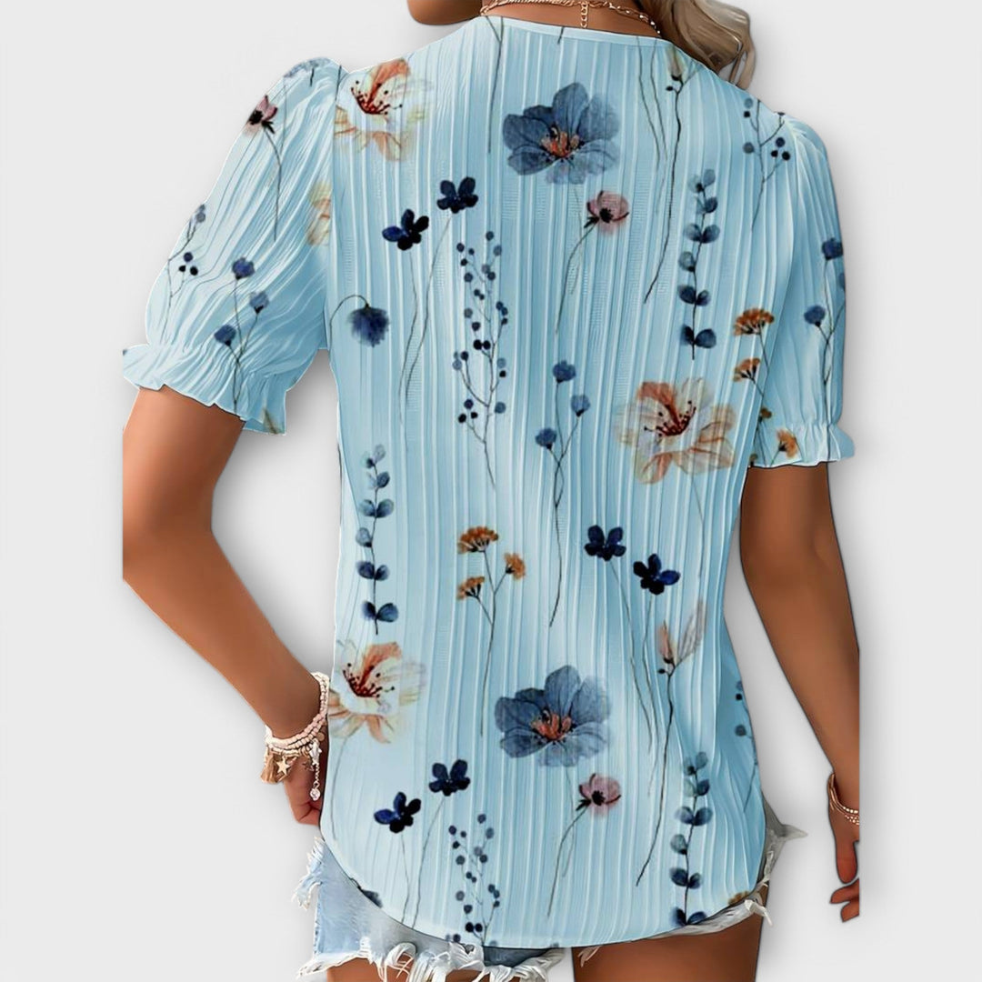 Bruna - Blusa elegante com um decote pontiagudo
