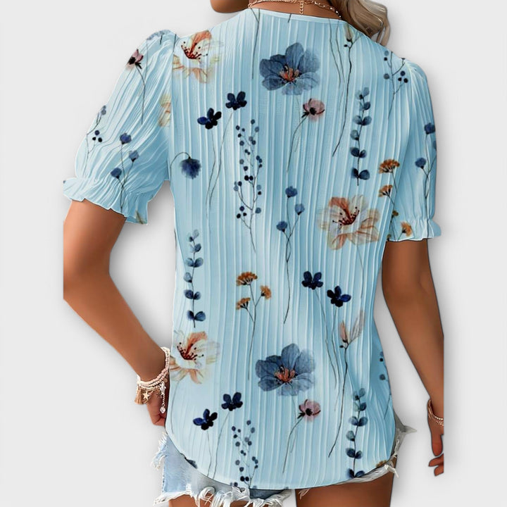 Bruna - Blusa elegante com um decote pontiagudo