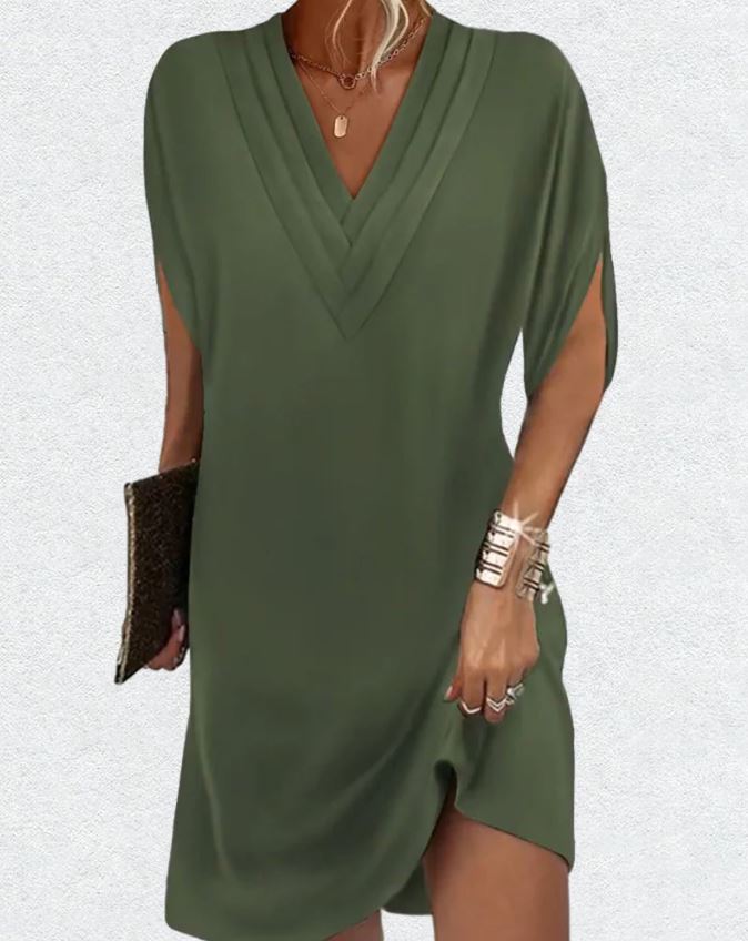 Elegante vestido liso com mangas com aberturas