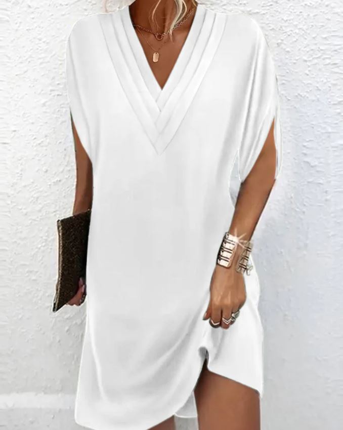 Elegante vestido liso com mangas com aberturas