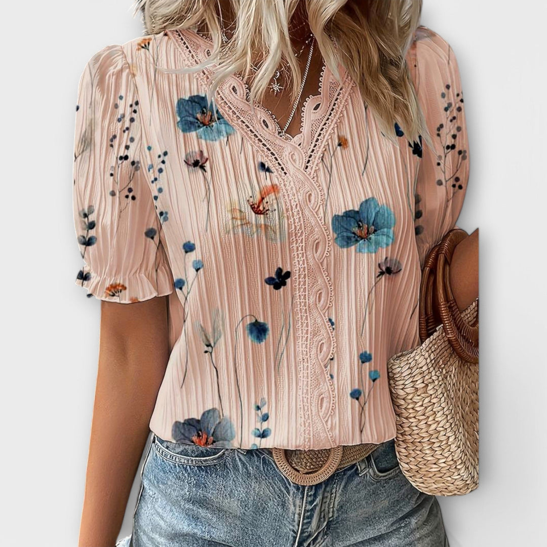 Bruna - Blusa elegante com um decote pontiagudo