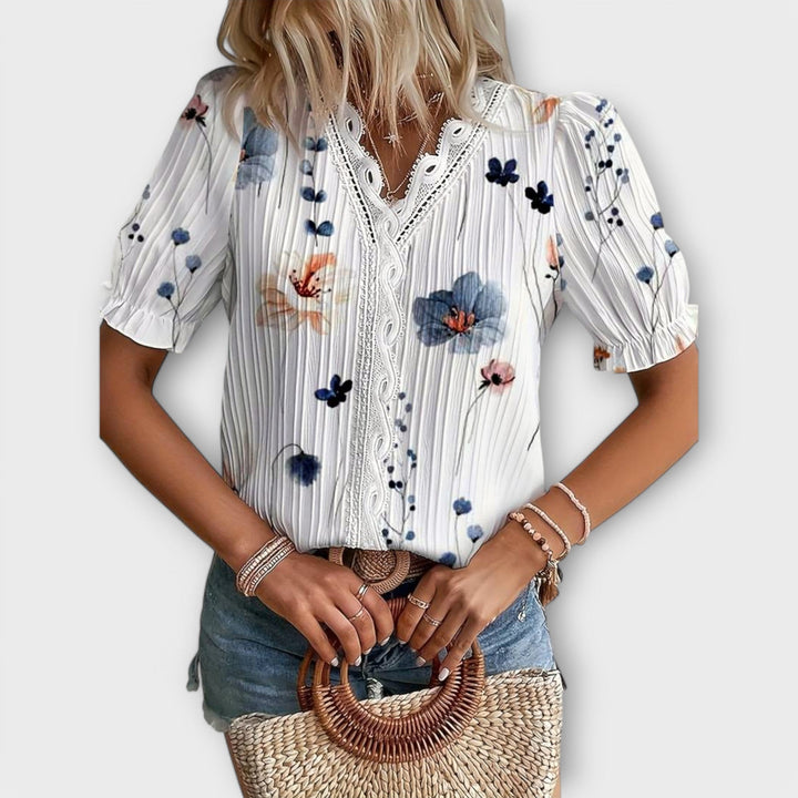 Bruna - Blusa elegante com um decote pontiagudo