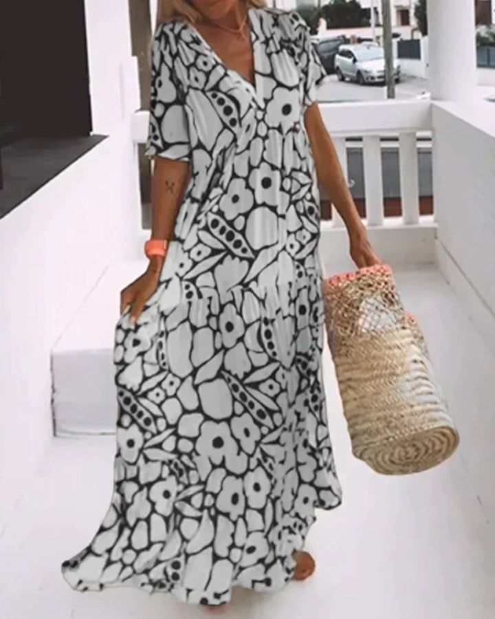 Vestido Solto com Estampado e Decote em V