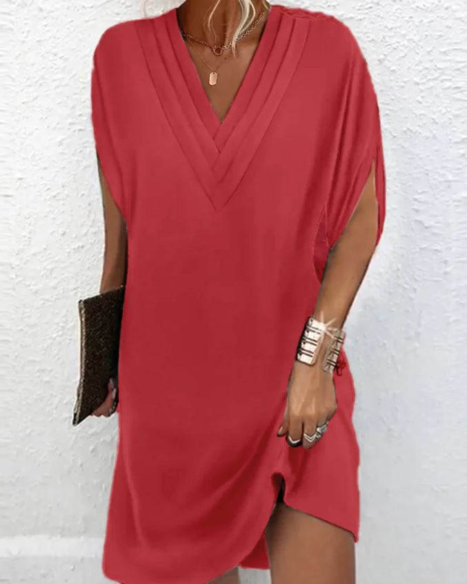 Elegante vestido liso com mangas com aberturas